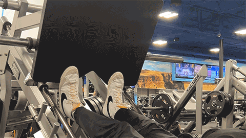 eos member performing a leg press calf raise