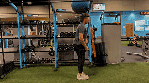 eos member performing a reverse lunge