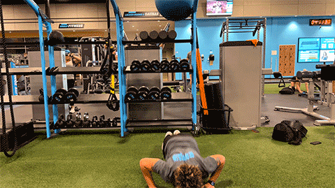 eos member performing burpees