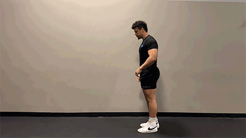 eos member performing a lunge with a twist