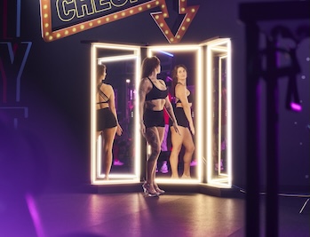 eos gym member posing in the set amenity 