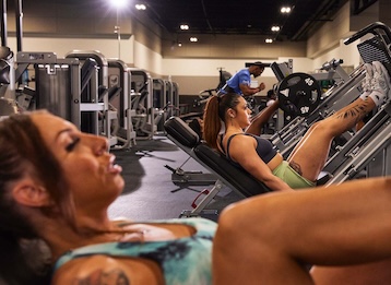 eos gym members using leg press machines